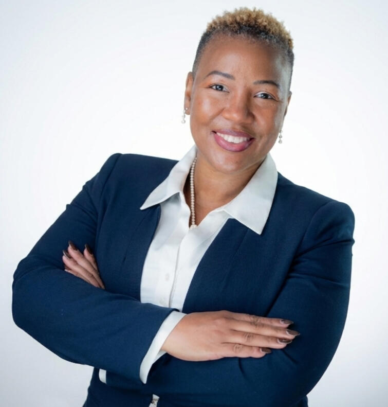 Founder Tameca N. Brown, Founder of BOLD Strategies Consulting, professional headshot in navy blazer.